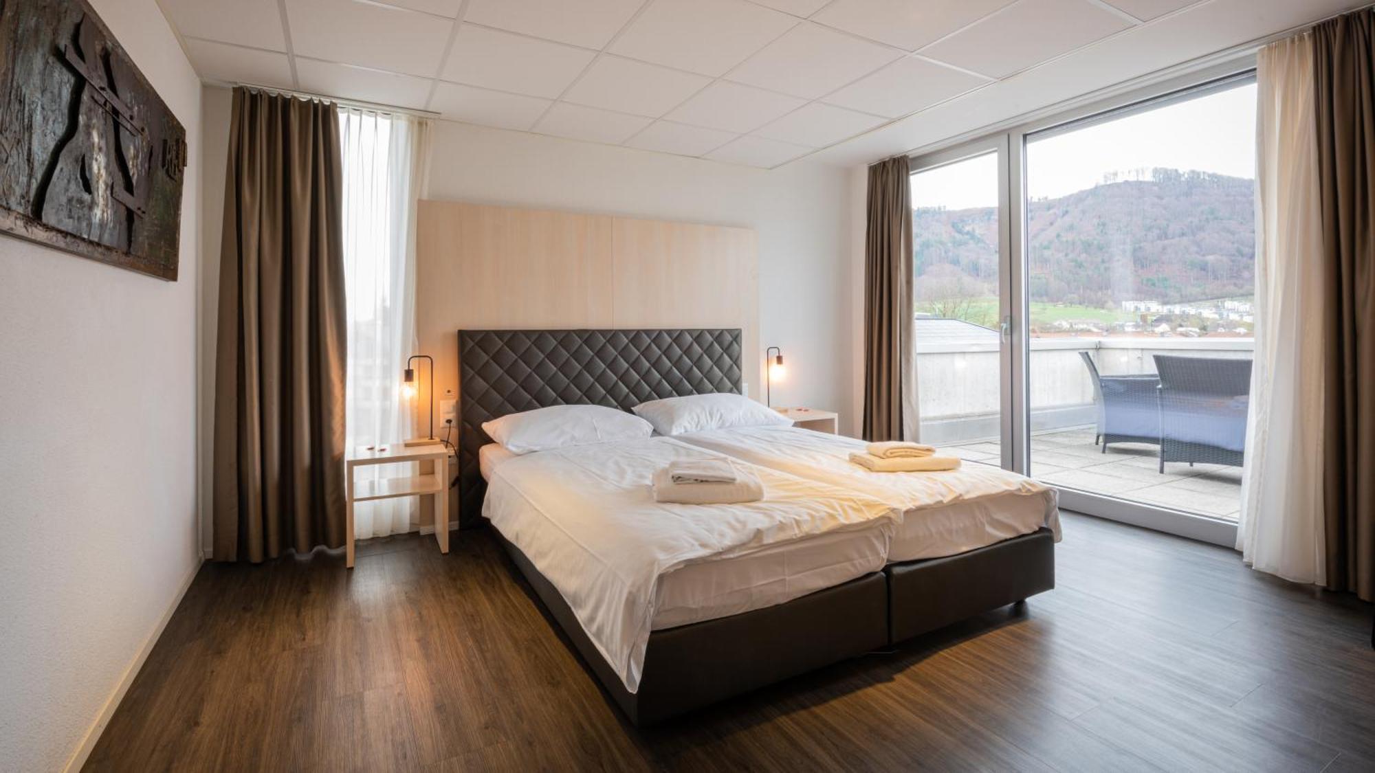 Los Lorentes Aparthotel Bern Airport ベルプ エクステリア 写真